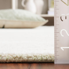 SAFAVIEH Handmade Abstract Leonide Modern Wool Rug